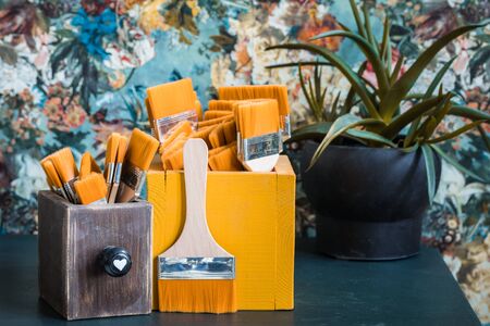 Brushes for paints in vintage wooden boxes, drawing concept, tonedの写真素材