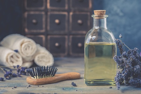 Bottle of natural cosmetic lavender oil, hair and body treatment, toned vintageの写真素材