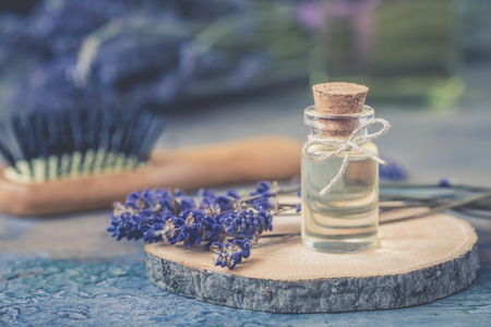 Bottle of natural cosmetic lavender oil, hair and body treatment, toned vintageの写真素材