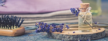 Bottle of natural cosmetic lavender oil, hair and body treatment, toned vintageの写真素材