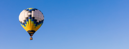 Colorful hot-air balloons flying in the sky, postcard conceptの写真素材