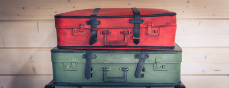 Vintage colourful pile of suitcases, travel luggage concept, tonedの写真素材