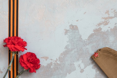 St. George ribbon and red carnation, may 9 Victory Day concept, symbol of the Second World war,...