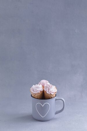 Marshmallow in ice cream cone on isolated backgroundの写真素材