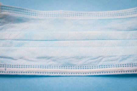 Protective surgical face mask, medical doctor care and hygiene conceptの写真素材