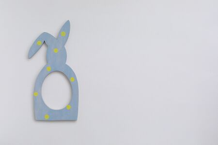 Mock up handmade bunny rabbit frame with yellow polka dot on beige background, Happy Easter sale or greeting postcard conceptの写真素材