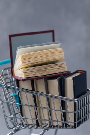 Books in trolley, back to school, college, University, World books Day conceptの写真素材