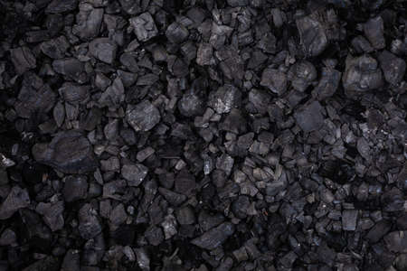 Black coal background top view selective focus, copyspaceの写真素材