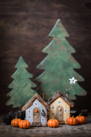 Miniature Thanksgiving Day little fairy autumn cottages, pumpkins, spiders, moss backgroundの写真素材