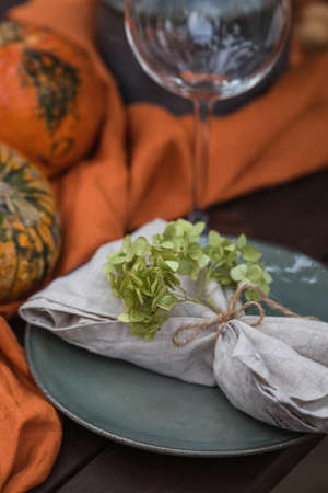 Fall themed holiday table setting arrangement for a seasonal party, tonedの写真素材