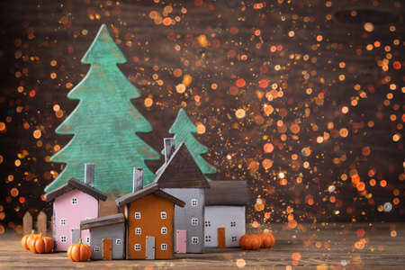 Miniature Thanksgiving Day little fairy autumn cottages, pumpkins, wooden background, postcard concept, tonedの写真素材