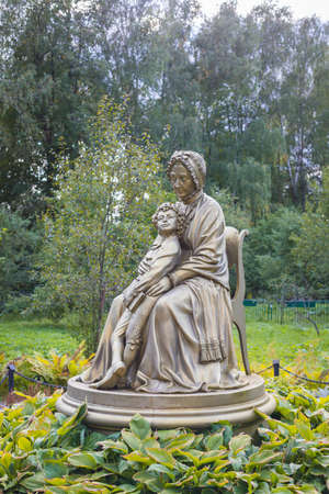 September, 2020. Zaharovo, Russia. The monument to famous Russian poet Pushkins nanny Arina Rodionovna in the apple gardenのeditorial素材