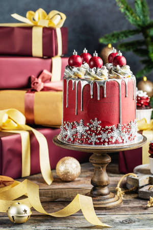 Christmas holiday cake decorated with sweet balls and snowflakesの写真素材