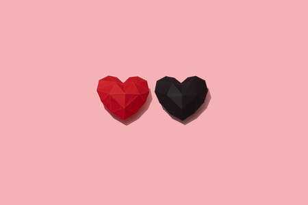 Red romantic paper hearts with a black one isolated on pink background, Saint Valentine's, February 14, Mothers Day concept postcard, cardiology health symbol, pattern, space for textの写真素材