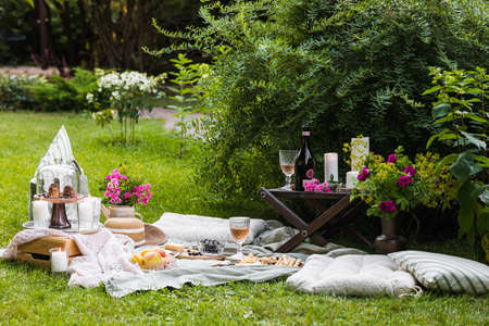 Summer romantic picnic in the gardenの写真素材