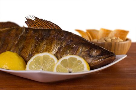 walleye hot smoked fish on a white background