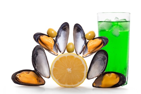 Mussels with lemon, olives and cocktail with iceの写真素材