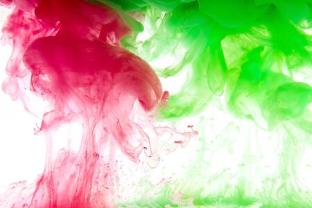 Mixing red and yellow pigments Flowの写真素材