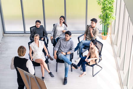Leader man and businessman brainstorm to solve problem, presentation new idea. People discuss in teamwork on new challenge topic seminar meeting. Business knowledge communication planning top view.の写真素材