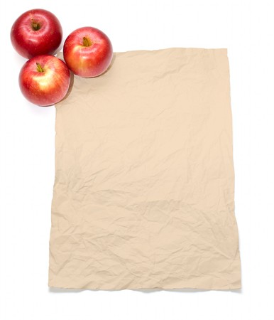 Grunge paper and three apples isolated on whiteの写真素材