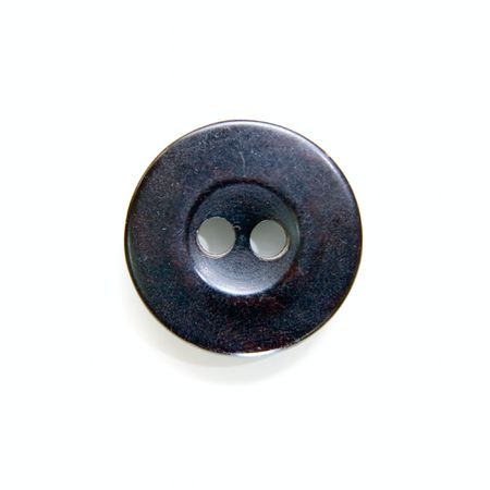 Old button isolated on white
