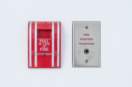 Fire alarm with fire fighters telephoneの写真素材