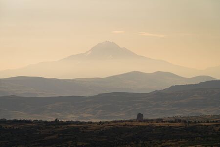 Layer of mountains and landscape of Capadocia plateau in a morning sunrise, central Anatolia in...