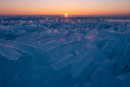Baikal frozen lake in winter season in a morning sunrise view from Uzury bay, Siberia, Russia, Asiaの写真素材