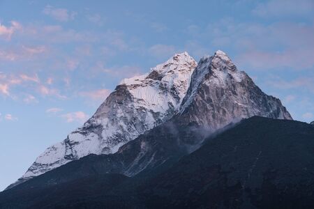Evening sunset light over Ama Dablam mountain peak in Everest base camp trekking route, Himalaya mountains range in Nepal, Asiaの写真素材