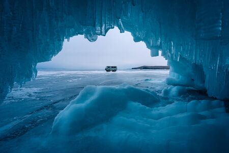 Blue ice cave in Baikal frozen lake in winter season, Siberia, Russia, Asia, Asiaの写真素材