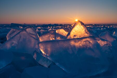 Baikal frozen lake in winter season in a beautiful morning sunrise, Siberia, Russia, Asiaの写真素材