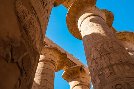 Stone column with Hieroglyphic in Karnak temple, biggest temple in the world in Luxor city, Upper...