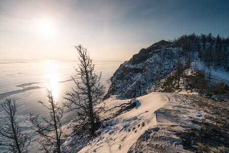 Top view of Uzury bay in a beautiful morning sunrise. Olkhon island in winter season. Baikal lake world biggest and deepest fresh water lake in the world. Siberia, Russia, Asiaの写真素材