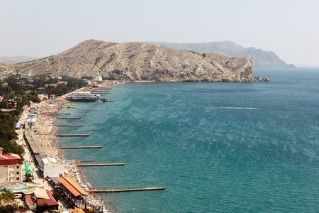Crimea, Sudak Bay. Summer day on the beach in Sudak.のeditorial素材