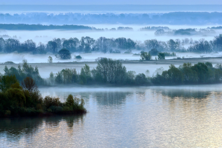 Spring. The morning fog lies along the Volga's banks.の写真素材