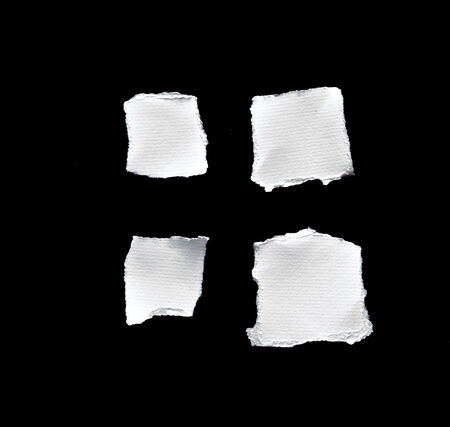 Picture of scrap of white paper on black backgroundの写真素材