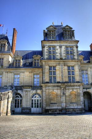 View of the Chateau de Fontainebleau and its famous stairway, situated close to Paris it introduced the Mannerist style of architecture to France and is the largest royal chateauのeditorial素材