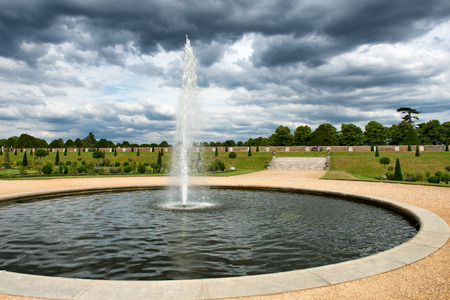 The Privy Garden with fountain and pond at Hampton Court Palace near London, UKのeditorial素材