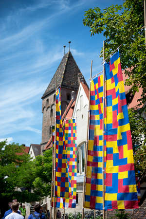 Metzerturm in Ulm, Germany and colorful flags during the annual International Danube Festivalのeditorial素材