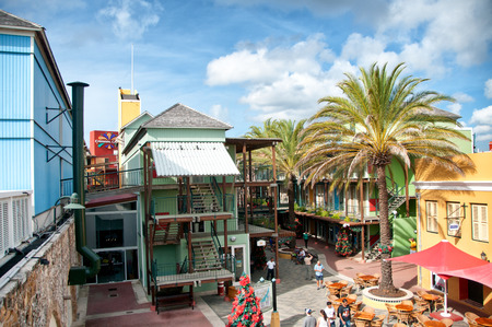 Rif Fort outdoor restaurant and street market in Willemstad, Curacao, Dutch Antilles in an urban square lined with tropical palm trees on a sunny dayのeditorial素材