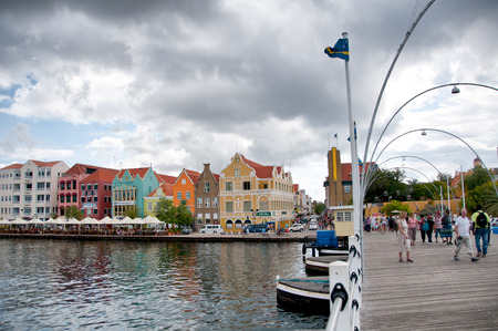 Punda district with its colorful dutch houses and Queen Emma bridge in Willemstad, Curacaoのeditorial素材
