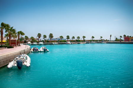 Small Boats in Hurghada Harbor with Aquamarine Waterのeditorial素材