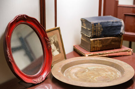 Collection of Historical Artifacts on Desk in Ship Quartersのeditorial素材