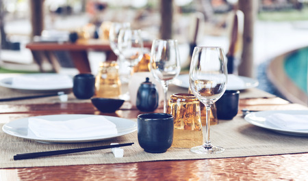 Table Place Settings at Upscale Outdoor Asian Restaurantの写真素材