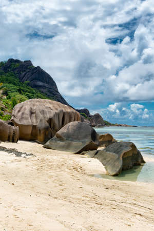 Close up Large Old Granite Rocks on White Beach Sand at Anse Source d'Argent in La Digue Island, Seychellesの写真素材