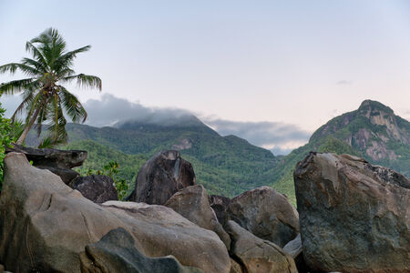 Old Large Rock Formations at the Beach of Mahe Island, Seychelles with White Beach Sand.の写真素材