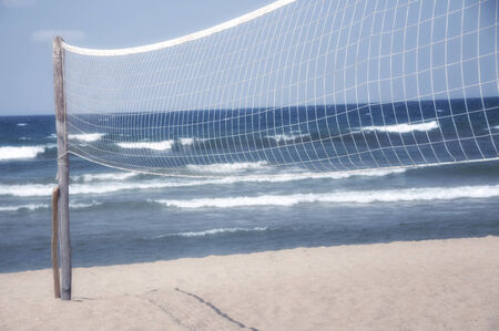 Volleyball net on empty beachの写真素材