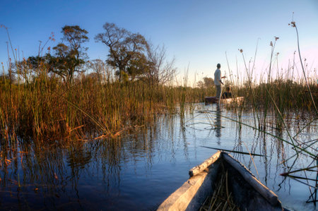 Fishermen at a riverの写真素材