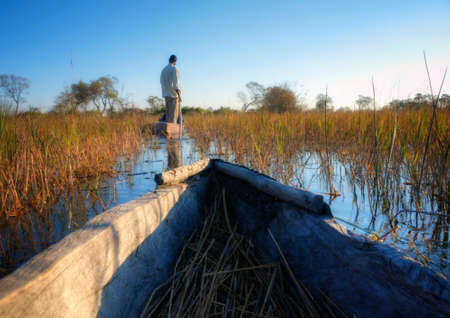 Fisherman at a riverの写真素材