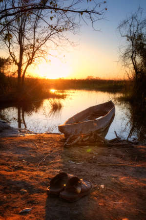 Boat at a riversideの写真素材